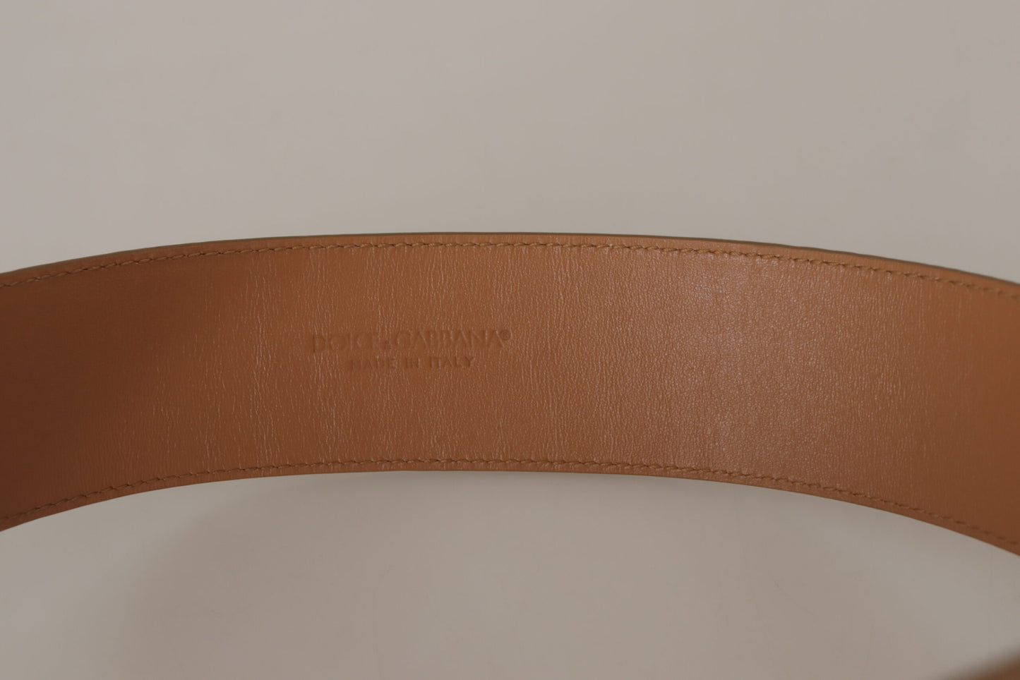 Dolce & Gabbana Elegant Beige Leather Belt with Engraved Buckle - KALAJ