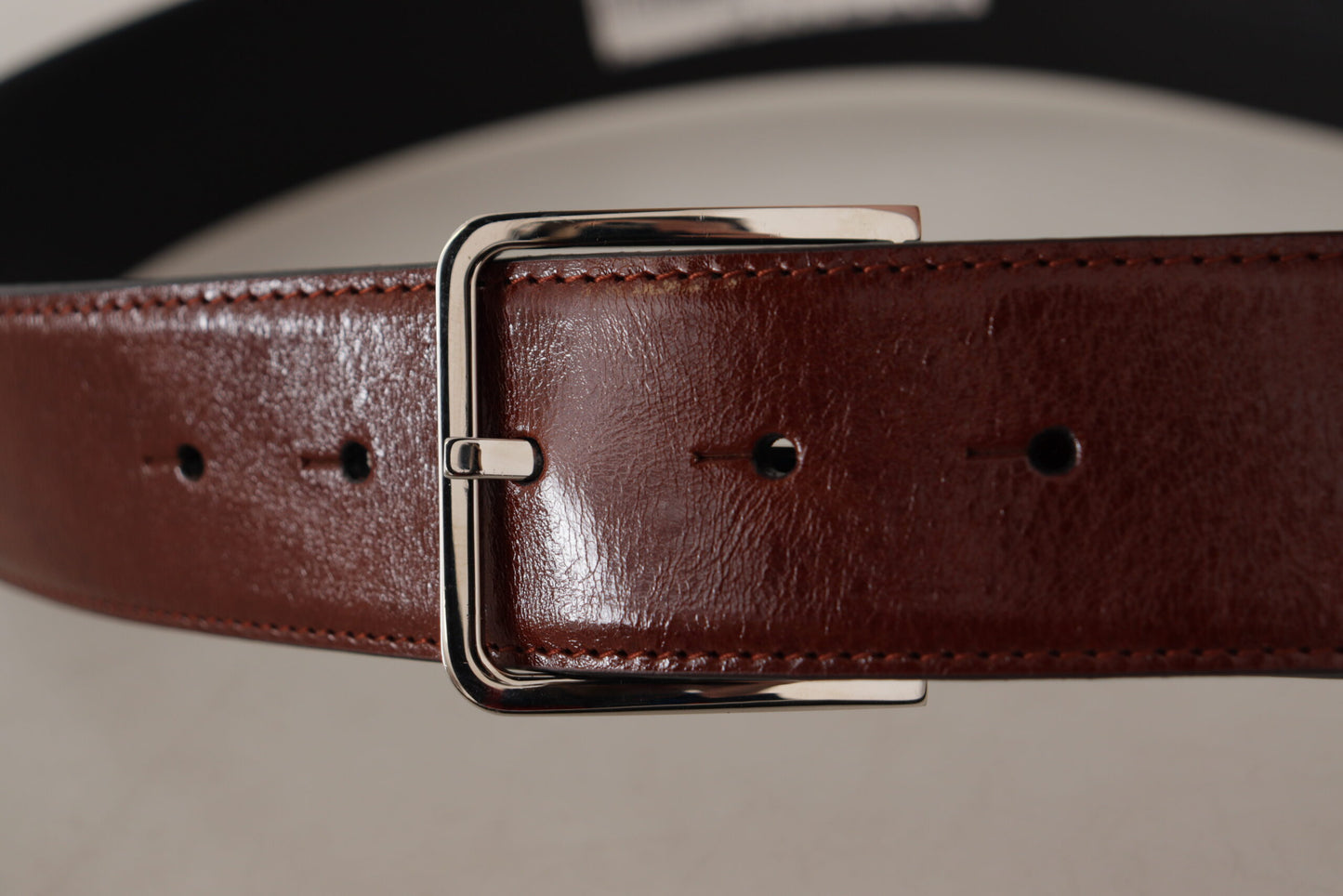 Dolce & Gabbana Elegant Leather Belt with Engraved Buckle - KALAJ